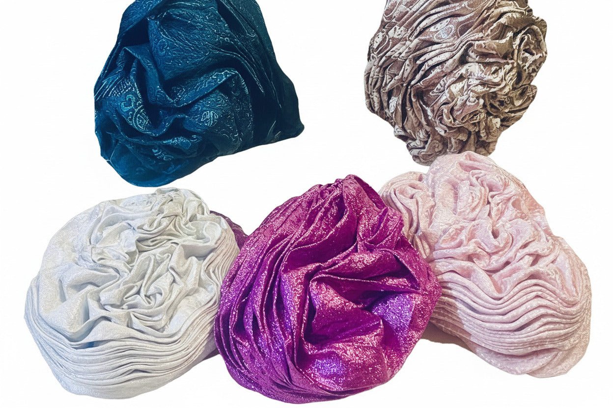 Elegant Nigerian Auto-Gele in pink damask pattern for formal celebrations